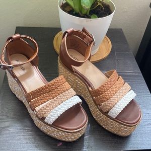 Brown high wedges. Never worn